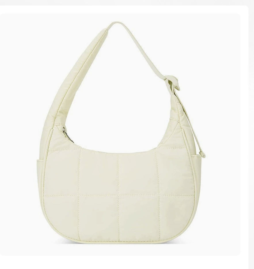 Large capacity shoulder bag by AB-28 in cream nylon with zip closure and snap lock phone pocket