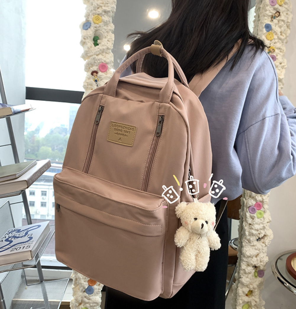 Large backpack by dropshipping in beige with front pocket for quick everyday access, zip closure
