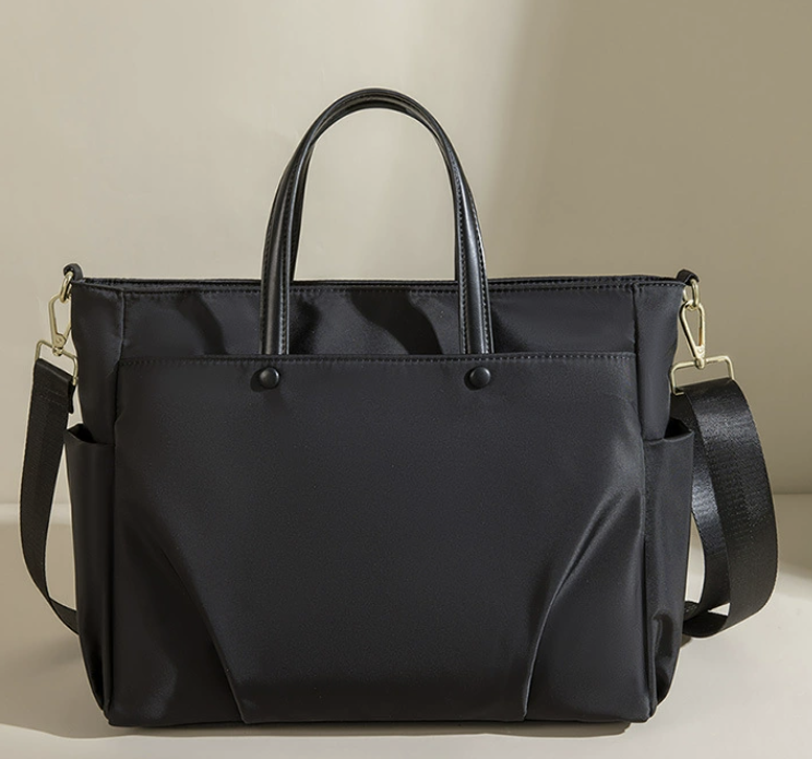 dropshipping large travel and work shoulder bag in black with water resistant Oxford fabric and laptop ready design