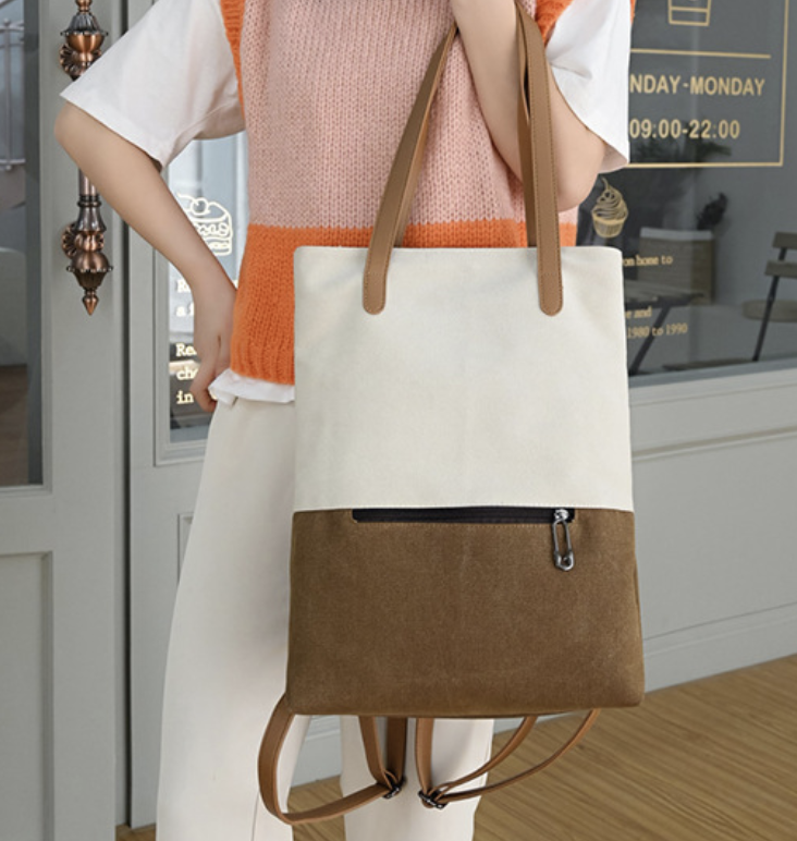 Multifunction canvas backpack by dropshipping in cream and brown with padded shoulder straps for campus study and work