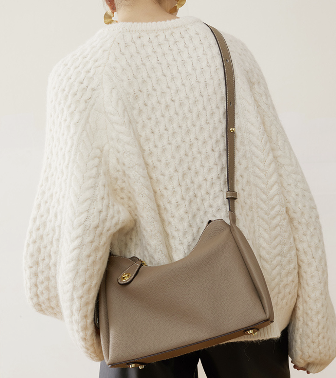 Real leather shoulder bag by AB-28 in taupe with a single shoulder strap and zip closure