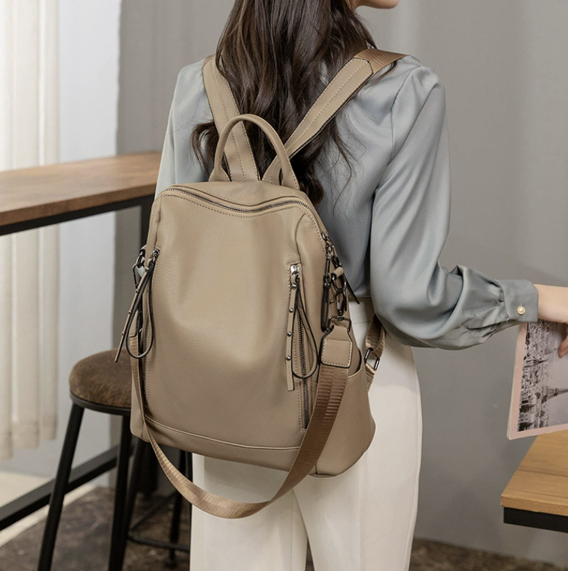 Soft leather look backpack by dropshipping in beige with padded shoulder straps for everyday travel