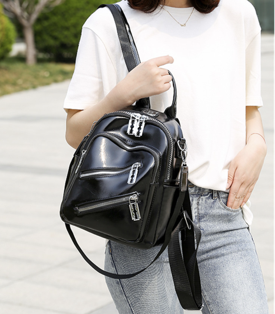 Classic black faux leather backpack by dropshipping with medium soft stiffness and PU material for work, study, travel