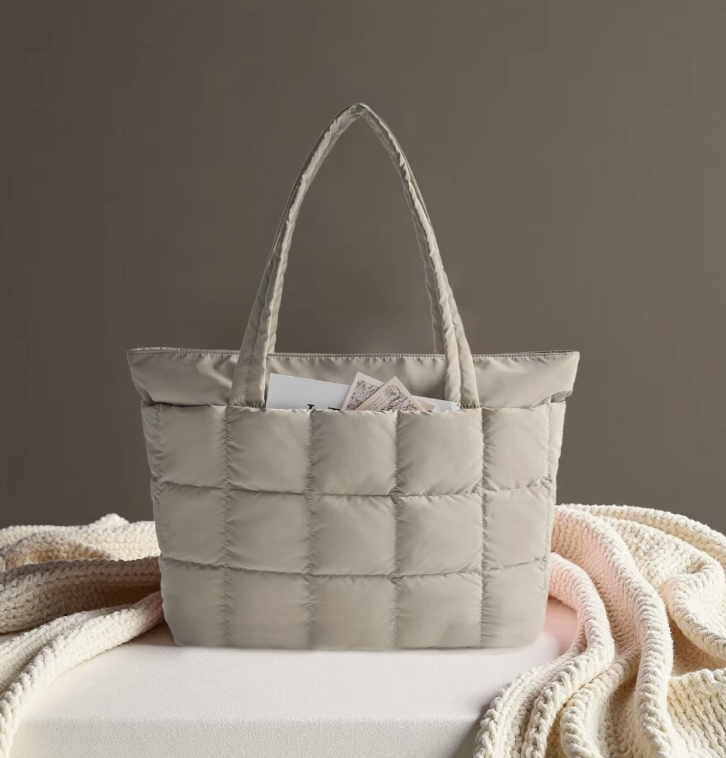 AB-28 travel and storage side bag in light gray nylon with soft padded quilted front and inner compartments