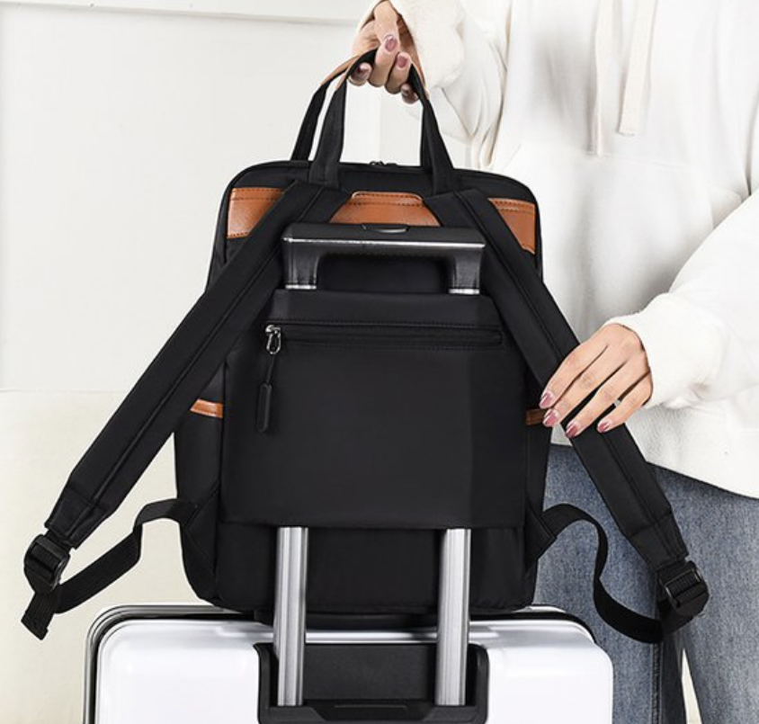 Women laptop backpack by dropshipping, black with padded shoulder straps and hidden pocket, shown open