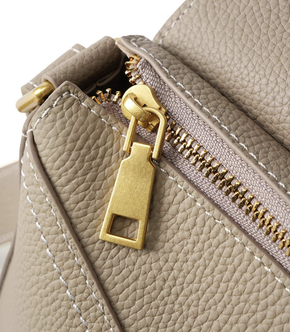 Tote crossbody bag AB-28 in light beige with adjustable shoulder strap and gold zipper detail
