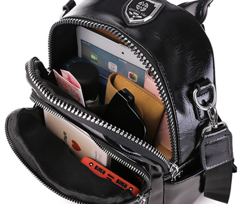Classic black PU backpack by dropshipping with medium soft firmness and a zippered front pocket