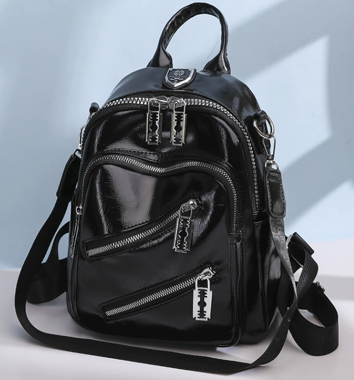 Classic black faux leather backpack by dropshipping with medium soft structure and PU material texture