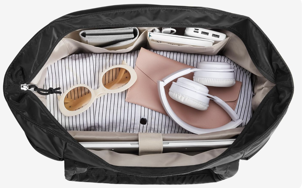 AB-28 travel and storage crossbody bag in black nylon with soft fabric and multiple compartments, open view