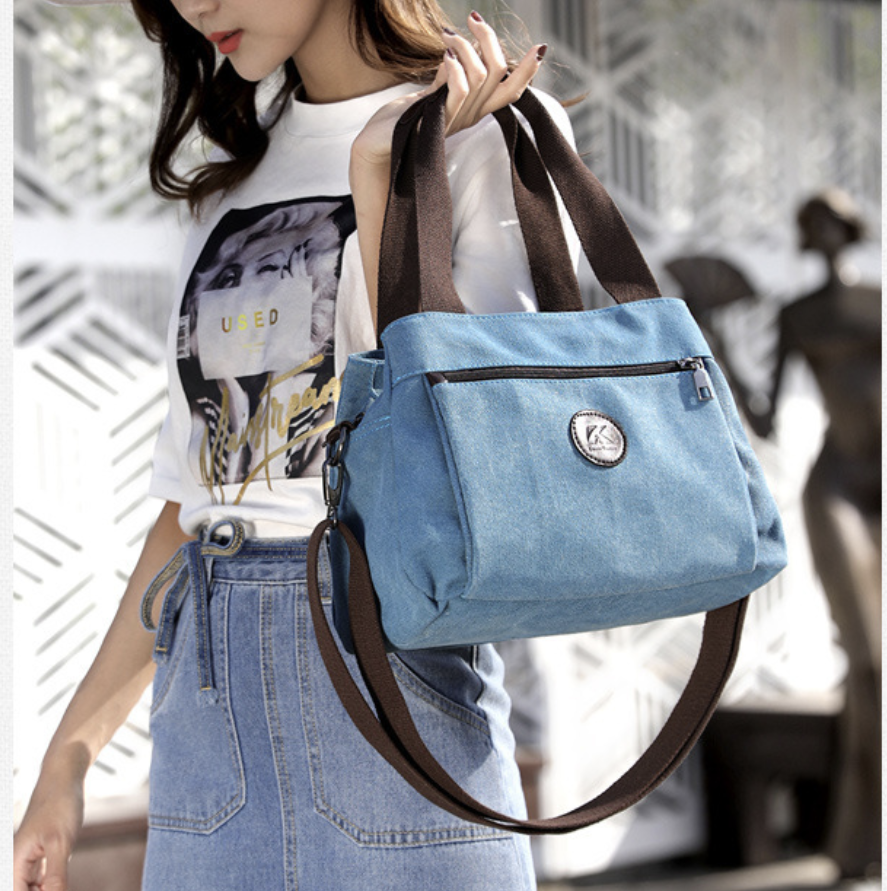 AB-28 soft canvas tote bag in blue with zip pocket, phone pocket, and document pocket for daily use