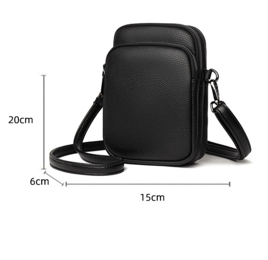 Mini PU crossbody bag by AB-28 in black with an internal document pocket and zipper closure