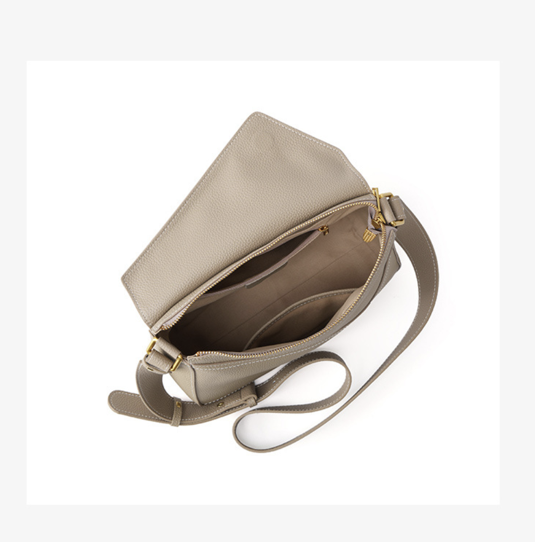 Unique crossbody bag AB-28 in taupe with adjustable shoulder strap and multiple pockets, shown open